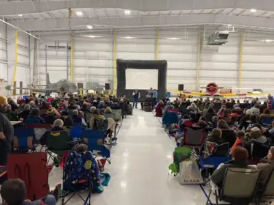 Movie premiere in airport hangar