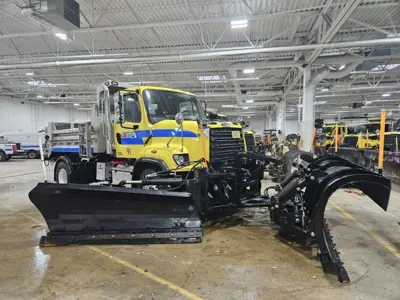 Highway Operations plow truck in main shop garage