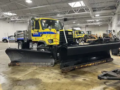 Highway Operations plow truck in main shop garage