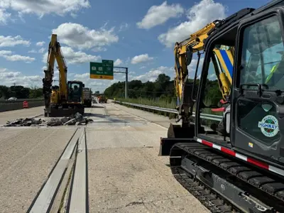 Highway operations equipment working on county highway